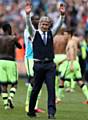 FAREWELL . . . City manager Manuel Pellegrini waves to the fans.