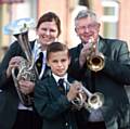 St Pauls Church, Hathershaw, Oldham Whit walk.Three generations from the Greenfield Band take part in the walk (l-r) Lindsey Rankin, Edward Rankin(9) and Norman Vizard.