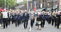 Whit Friday walks in Uppermill. At the front of the procession, L/R, Reverend, Duncan Rhodes, Dorothy Rhodes, secretary of Diggle band.
