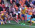 ADAM Clay celebrates scoring a late try ­- but it wasn't enough to squeeze Oldham home to victory on a day to forget in Blackpool     