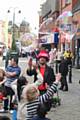 Street entertainment in Oldham town centre. The Bubble Wizard entertains the crowd.