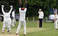 THAT'S OUT . . . Mel Whittle, playing for Hollinwood, traps Shaw's Saim Ghouri leg before wicket in the Tanner Cup clash at Lime Lane. 