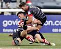 GROUNDED . . . Oldham forward Liam Thompson is brought to the turf by the Broncos defence. 
