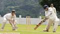 ATTACK . . . Werneth's Ali Muzaffar makes room to launch the ball to the boundary. The skipper made a vital 80