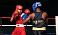 TOE-TO-TOE . . . Oldham's Nenny Hussain stays focused on his way to a points victory