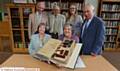 MEET the Mellodews . . . (back, from left) William Hartley, Michael Hawley, Jo Robson (archive officer) and Norman Deakin. Front: granddaughters of James Arthur Mellodew, Carolyn Deakin and Nicky Hawley