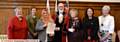 From left, council leader Jean Stretton, Chris Foley, a friend of Marzia Babakarkhail, Marzia,  Mayor Derek Heffernan, Mayoress Di Heffernan, MP Debbie Abrahams and Anne Sykes, Deputy Lieutenant of Greater Manchester
