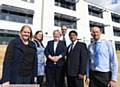 NORTHMOOR Academy almost complete...from left, Councillor Amanda Chadderton, Jessica Hainsworth (principal), Oldham Council leader Councillor Jean Stretton, Conor Hanratty (managing director Extra Space), Councillor Abdul Jabbar (deputy leader Oldham Council) and Barney Harle (capital works and energy manager with Oldham Council
