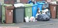 OVERFLOWING bins fear over the new three-weekly collections