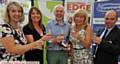 CHEERS . . . (from left) Bridget Batty (Limetree PR), Suzanne Wright (Pearson Solicitors), Simon Woods (wine host), Stephanie Doherty (Caremark), Robbie MacDonald (Chronicle Business Editor)