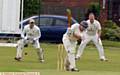 HEYSIDE opener Ben Holt clips the ball away