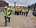 CONSTRUCTION starts . . . Laura Lee (chief executive of Maggie's) and Sir Norman Stoller with dignitaries behind