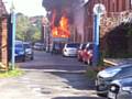 UP in flames . . . the caravan at Taurus St Hill Stores