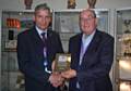 Radclyffe School headteacher Hardial Hayer (left) receives his silver teaching award from chariman of governors Jim Greenwood.