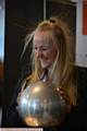 The Big Bang science event at the Regional Science Centre for local schools, organised by Oldham Sixth Form College and Oldham Business Leadership Group. Ella Caine (14) from Blue Coat School feels the full effect of the Van de Graaff Generator.