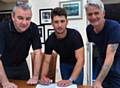 SIGN HERE . . . Danny Wright with Steve Wood (left) and trainer Ben Lancaster