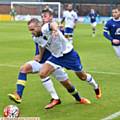 ON THE CHARGE . . . Athletic's Ryan McLaughlin takes on the Everton defence in last night's Lancashire FA Senior Cup Final. PICTURE by ALAN HOWARTH