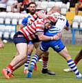 HARD TO STOP . . . Oldham's Michael Ward (left) is a danger when close to the line