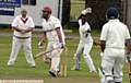 TAKING AIM . . . Friarmere wicketkeeper Anton Lucas-Jones tries to catch Werneth's Ali Umar out of his crease