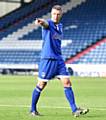 POINTING THE WAY . . . Peter Clarke was handed the captain's armband for his debut against Preston