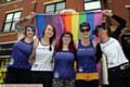 Oldham Rainbow Pride. Roller City, Roller Derby girls (l-r) Janine Bailey, Emma Lyskava, Em Whetham, Rachel Gordon and Helen Jones.
