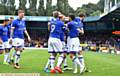 HAPPY DAYS . . . Athletic's Lee Erwin (third left) heads to join in the goal celebrations at Gigg Lane on Saturday