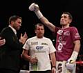 CHAMP . . . Crolla (right) with Eddie Hearn and trainer Joe Gallagher