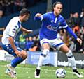 IMPRESSED . . . Charles Dunne shows composure on the ball in the victory at Bury