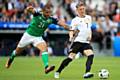 NORTHERN Ireland's Josh Magennis (left) and Germany's Bastian Schweinsteiger battle for the ball during the UEFA Euro 2016. Athletic's hopes of signing Magennis appear to be diminishing