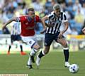 GOAL . . . Peter Clarke (left)