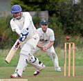 UPPERMILL batsman Mark Berry clips the ball off his legs against Milnrow.