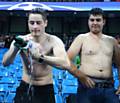 WET THROUGH . . . a Borussia fan wrings out his shirt