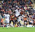 COMBATIVE . . . Ousmane Fane, pictured in action at Bradford, has been schooled thanks partly to hard knocks