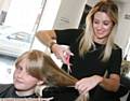 HAIR stylist Lauren Cornwall gets to work