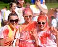 ALL in red . . . Evie Herring (10), Olivia Kershaw (9) and Milly Massey (9)