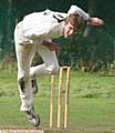 BIG EFFORT . . . Jack Boyle, bowling for Saddleworth