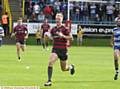 TWO-UP . . . Kieran Gill takes up possession and races home for his second try