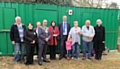 Mayor of Oldham, Shadab Qumer, with Cllr Ginny Alexander and David Smith (center) and left to right Colin Howarth, Sarah, Elaine Howarth, Rose Johnstone, Martyn Atkinson, and the Rev Denise Owen 