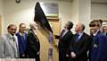 OPENING ceremony . . . Mr Nott unveils the plaque watched by, from left, Vijay Srivastava (chairman of governors), Daisy Hilton, Oldham mayor Councillor Derek Heffernan, David Nott, Craig Mairs (principal) and Mia Robinson