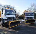 READY for action . . . two of Oldham's gritters