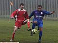 EYES DOWN . . . Springhead Libs’ Ben Cullen (left) and
Crown’s Danny Browne challenge for the ball