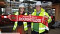 GREAT SUPPORT...Maggie's fundraising manager Laura Tomlinson and Oldham RL chairman Chris Hamilton launch the kit sponsor partnership on the site of the new Maggie's centre in Oldham. 