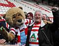 HAPPY DAYS . . . Roary with fan Ray Fletcher after the Challenge Cup win at Hull KR last season