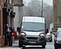 MESSAGE not being delivered . . . this van narrowly avoids a postman on Retiro Street