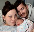 PROUD . . . Olivia Nuttall and Joshua Crosby with their new Year's Day baby Penelope