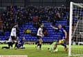 SO CLOSE ...Port Vale goalkeeper Jak Alnwick tips Billy Mckay's stoppage-time shot onto a post