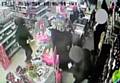 CCTV of the armed robbery in progress