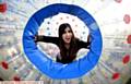 HAVING A BALL . . . Haffsah Nazir goes Zorbing at Hathershaw College staff enrichment activities
