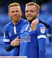 SMILE...Goal scorer Ryan McLaughlin (right) gets a hug from Paul Green after extending Athletic's lead against Coventry. 