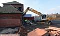 COMING DOWN . . . Demolition work begins at Byron Street School, Royton